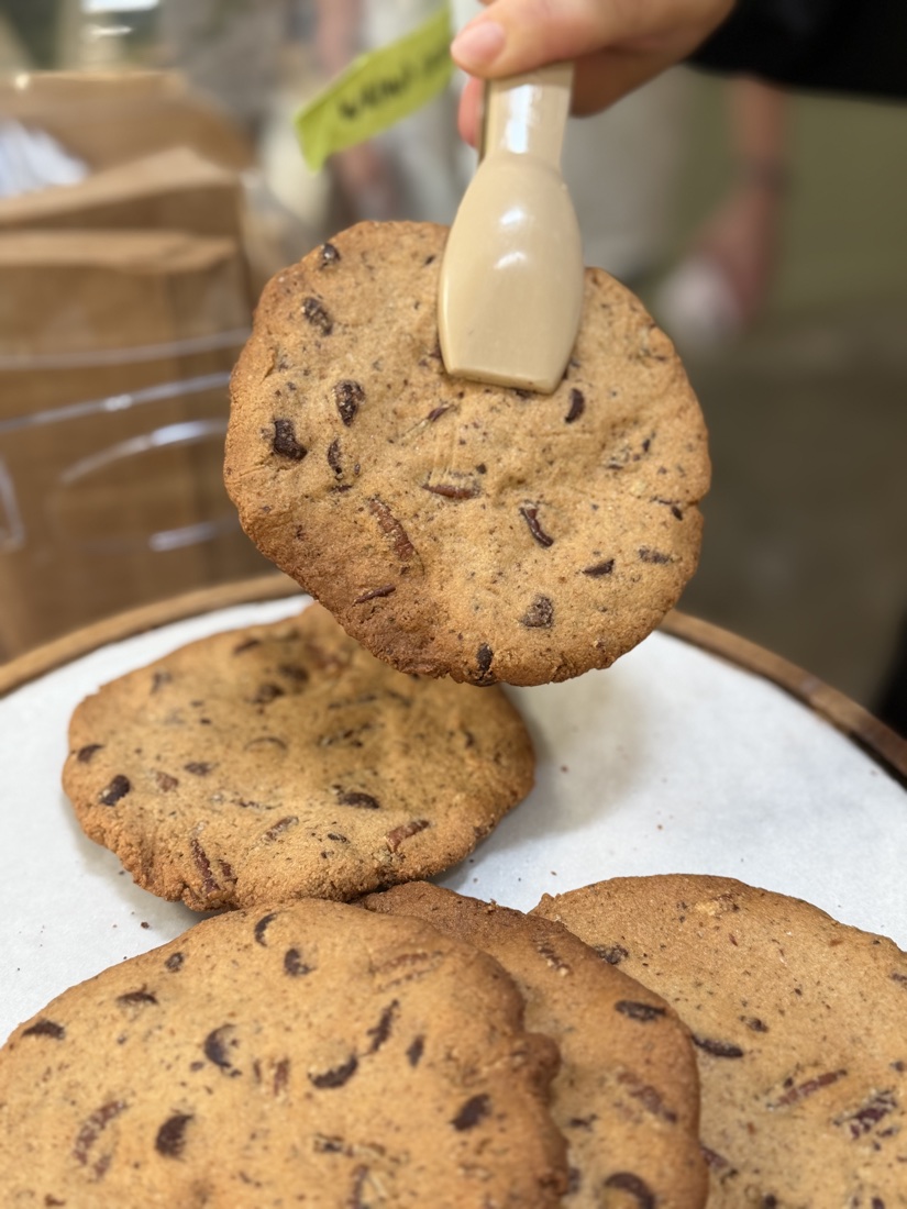 Fresh-baked plant-based chocolate chunk cookies at Casa de Luz East