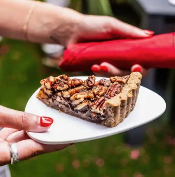 A slice of pecan tart served on a plate at a VWR retreat