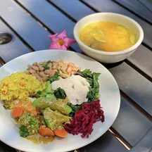 A whole-food plant-based dinner plate with soup at a VWR retreat