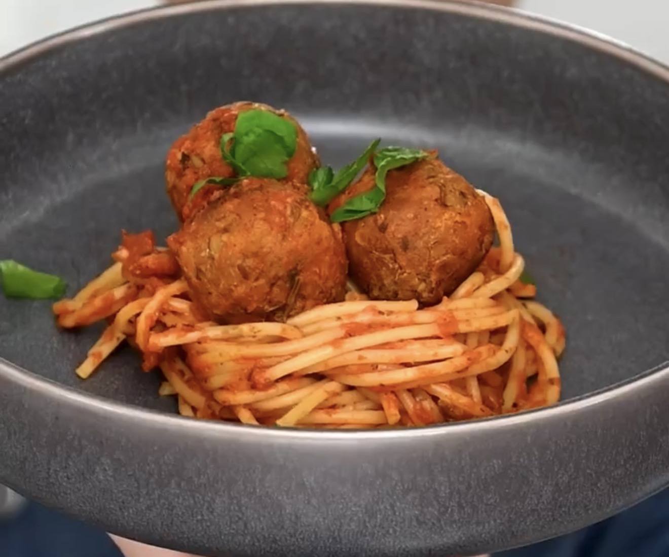 Spaghetti in marinara topped with baked Italian lentil meatballs
